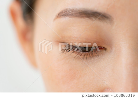 Middle-aged woman around the eyes 103863319