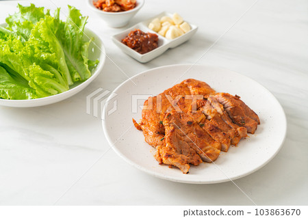 grilled pork marinated Kochujang sauce in Korean style with vegetable and kimchi grilled pork marinated Kochujang sauce in Korean style with vegetable and kimchi 103863670