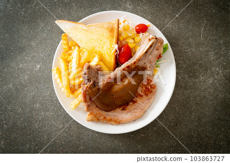 pork chop steak with chips and mini salad pork chop steak with chips and mini salad 103863727