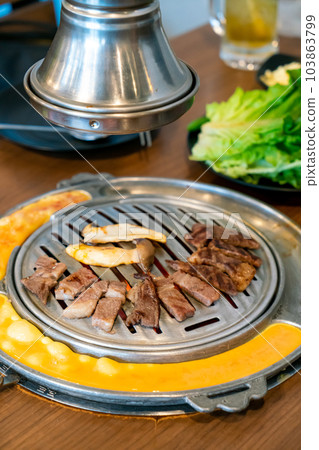 grilled meat in Korean style or Korean BBQ grilled meat in Korean style or Korean BBQ 103863799