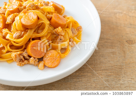 spaghetti pasta sausage and minced pork 103863897