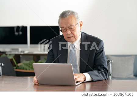 Businessman worry laptop computer 103864105