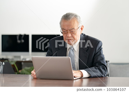 Businessman worry laptop computer 103864107
