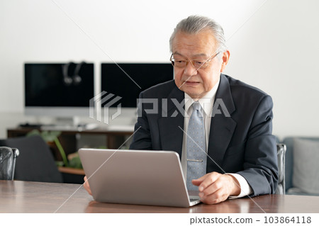 Businessman worry laptop computer 103864118