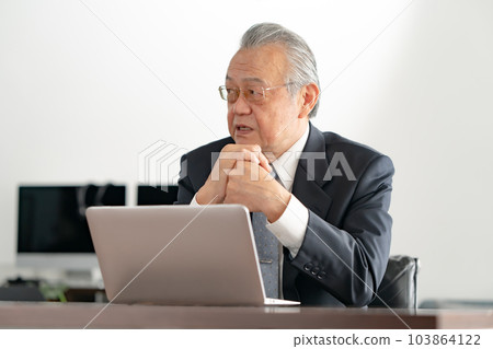 Businessman worry laptop computer 103864122