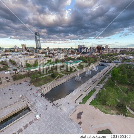 Embankment of the central pond and musical fountain. The historic center of the city of Yekaterinburg, Russia, Aerial View Embankment of the central pond and musical fountain. The historic center of the city of Yekaterinburg, Russia, Aerial View 103865363
