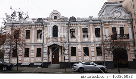 Kiev, Ukraine November 28, 2020: Facade of a building artistically decorated with columns in the center of Kiev 103866088