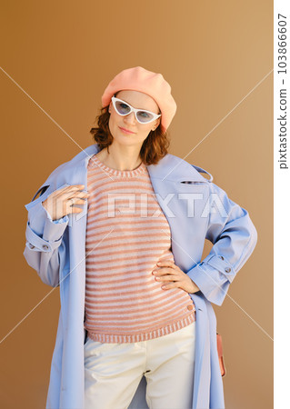 Beautiful woman in stylish european outfit 103866607