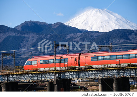 Odakyu Romance Car GSE crossing the Sakawa River in winter with Mt. Fuji in the background 103866707