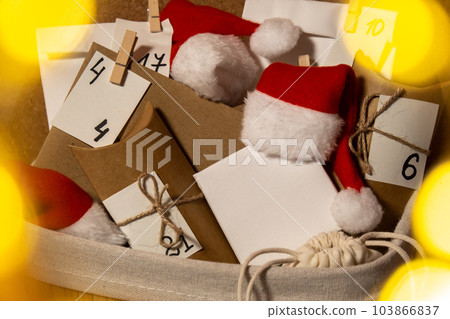 Original Advent Calendar for Christmas Homemade. Preparation to Christmas concept. Family winter holidays. Eco friendly presents gifts. open the package every day 103866837