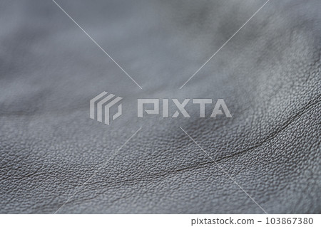 Closeup full grain gray brown leather background Closeup full grain gray brown leather background 103867380
