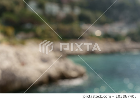 Blurred background of Cap de Nice in spring in daytime Blurred background of Cap de Nice in spring in daytime 103867403