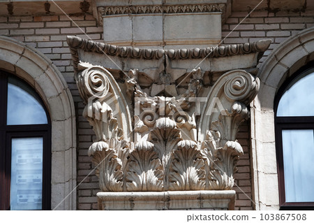 Kiev, Ukraine May 16, 2020: Architectural decorations of ancient buildings Kiev, Ukraine May 16, 2020: Architectural decorations of ancient buildings 103867508