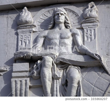 Kiev, Ukraine April 13, 2021: Architectural decorations, frescoes on a building with different subjects from ancient legends in the city of Kiev 103868207