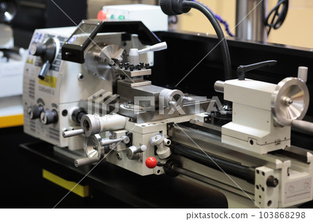 conventional metalworking lathe in a workshop 103868298