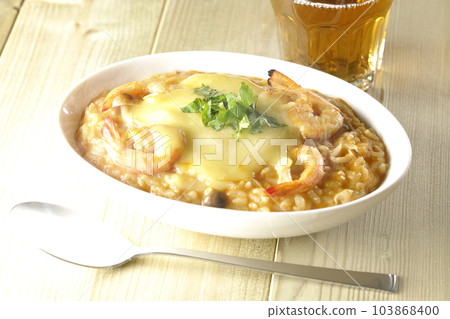 Shrimp, cheese, coriander, hot tom yum risotto and tea 103868400