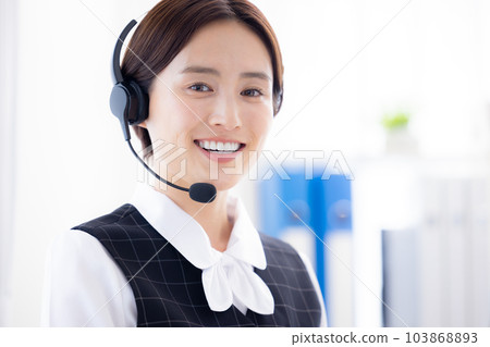 woman working in a call center woman working in a call center 103868893