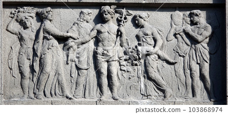 Kiev, Ukraine June 10, 2020: Artistic decoration of the facade of the building with sculptures of people in the city of Kiev Kiev, Ukraine June 10, 2020: Artistic decoration of the facade of the building with sculptures of people in the city of Kiev 103868974