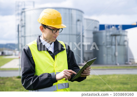 Engineer with digital tablet 103869160