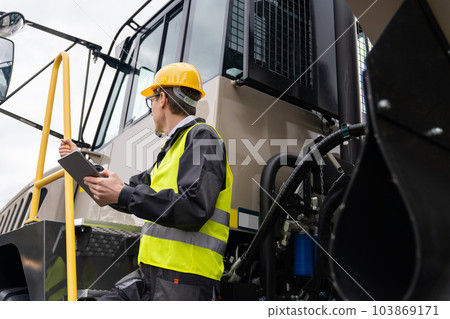 Engineer with mining truck 103869171