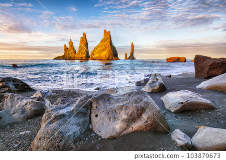 Breathtaking view of rock formations Troll Toes on Black beach Reynisfjara near the village of Vik. 103870673