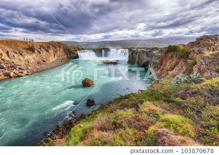 Breathtaking landscape scene of powerful Godafoss waterfall. Breathtaking landscape scene of powerful Godafoss waterfall. 103870678