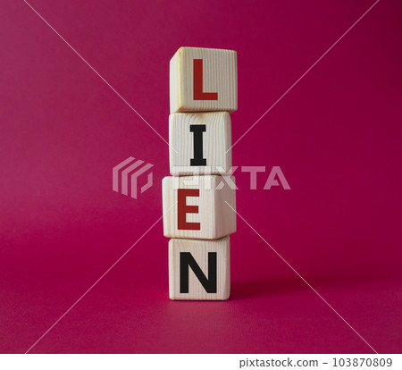 Lien symbol. Concept word Lien on wooden cubes. Beautiful red background. Business and Lien concept. Copy space. 103870809