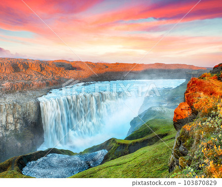 Breathtaking sunset view of the most powerful waterfall in Europe called Dettifoss Breathtaking sunset view of the most powerful waterfall in Europe called Dettifoss 103870829