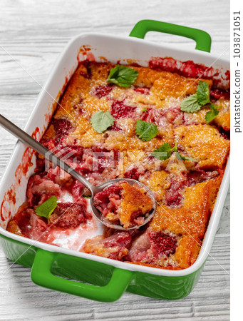 strawberry cobbler, summer dessert in baking dish 103871051