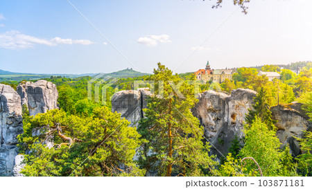Bohemian Paradise, Czech: Cesky Raj, panorama. View of Hruba Skala Castle, Trosky Castle Ruins and sandstone rocks from Marianska Lookout on sunny summer day, Czech Republic Bohemian Paradise, Czech: Cesky Raj, panorama. View of Hruba Skala Castle, Trosky Castle Ruins and sandstone rocks from Marianska Lookout on sunny summer day, Czech Republic 103871181