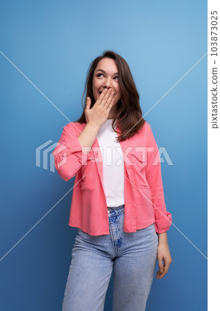 portrait of well-groomed european woman in casual look isolated with studio background 103873025