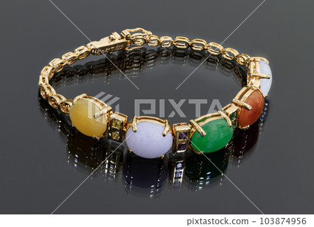 Beautiful Gold Jade Bracelet has many colors and has different meaning. Beautiful Gold Jade Bracelet has many colors and has different meaning. 103874956