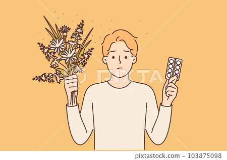 Allergic man with flowers and pills to treat immune problems caused by pollen from flowering plants 103875098