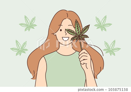 Woman holds cannabis leaf recommending legalization of marijuana use for medical purposes Woman holds cannabis leaf recommending legalization of marijuana use for medical purposes 103875138