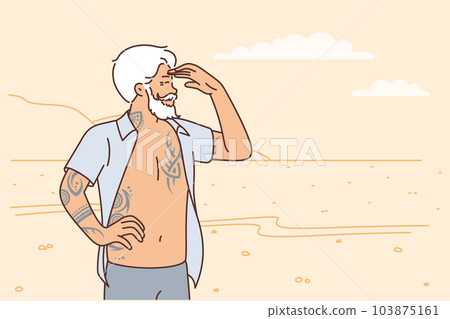 Elderly brutal man stands on beach in unbuttoned shirt and looks in distance enjoying life 103875161