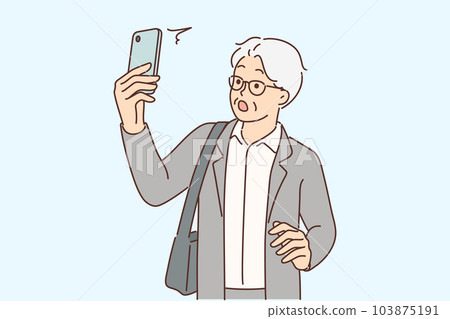 Elderly man with phone is shocked by news saw in application or sms message from business partner Elderly man with phone is shocked by news saw in application or sms message from business partner 103875191