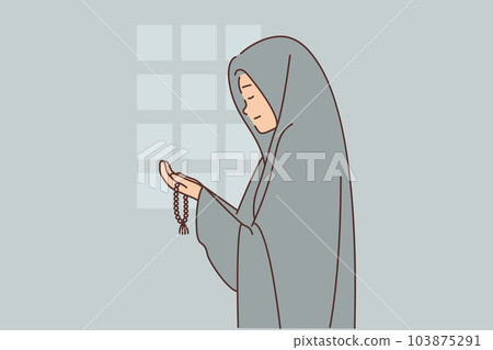 Muslim woman dressed in chador prays in mosque or performs namaz asking allah for help Muslim woman dressed in chador prays in mosque or performs namaz asking allah for help 103875291