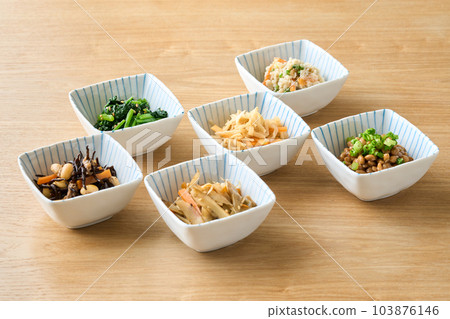 Various side dishes served in small bowls Various side dishes served in small bowls 103876146