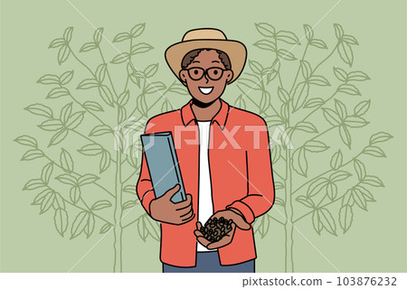 Smiling African American man with coffee beans on plantation Smiling African American man with coffee beans on plantation 103876232