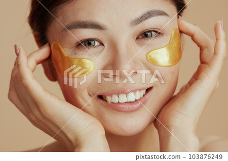 Portrait of young asian woman with eye patches 103876249