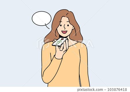 Smiling woman record voice message on phone  103876418