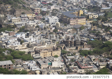 Jaipur city and old temples situated at the foothills of Jaigarh Fort situated on Cheel ka Teela or Hill of Eagles of the Aravalli range, it overlooks the Amer Fort and the Maota Lake, near Amer Jaipur city and old temples situated at the foothills of Jaigarh Fort situated on Cheel ka Teela or Hill of Eagles of the Aravalli range, it overlooks the Amer Fort and the Maota Lake, near Amer 103877373