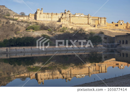 Amber fort located high on a hill is known for its artistic style elements, with large ramparts and series of gates and cobbled paths. The fort overlooks Maota Lake, the main source of water for the 103877414