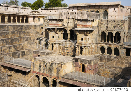 Chand Baori, a deep four-sided stepwell with a large temple located in the back of the well, it extends 30m (100ft) into the ground, making it one of the deepest and largest stepwells in India. Chand Baori, a deep four-sided stepwell with a large temple located in the back of the well, it extends 30m (100ft) into the ground, making it one of the deepest and largest stepwells in India. 103877490