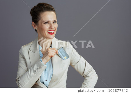 happy elegant business woman in light business suit 103877842
