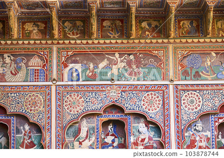 Colourful paintings on the inner wall of Mandawa haveli, now converted in to a Heritage Hotel, built in 1890, located in Mandawa, Shekhawati, Rajasthan, India 103878744