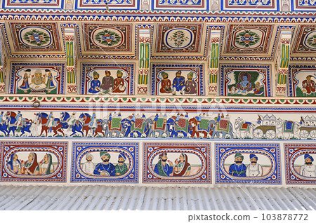 Colourful paintings on the outer wall of Seth Harmukhrai Sanehiram Chokhani Double Haveli, located in Mandawa, Shekhawati, Rajasthan, India 103878772