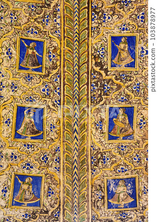 Colourful paintings on the ceiling of an old chhatri (cenotaph), Seth Anantram Podar and family ki smarak rupi chhatri, located in Ramgarh, Shekhawati, Rajasthan, India 103878977