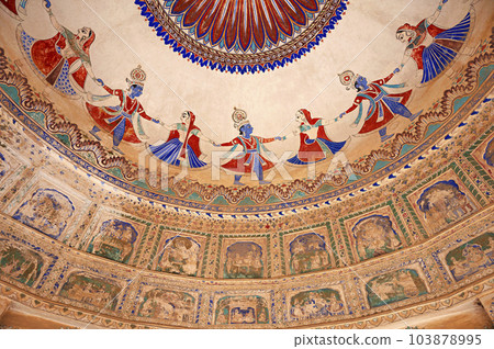 Colourful paintings on the ceiling of an old chhatri (cenotaph), Seth Anantram Podar and family ki smarak rupi chhatri, located in Ramgarh, Shekhawati, is a semi-arid historical region, this region Colourful paintings on the ceiling of an old chhatri (cenotaph), Seth Anantram Podar and family ki smarak rupi chhatri, located in Ramgarh, Shekhawati, is a semi-arid historical region, this region 103878995