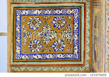 Colourful ceiling painting on the outer wall of an old haveli, located in Ramgarh, Shekhawati, Rajasthan, India Colourful ceiling painting on the outer wall of an old haveli, located in Ramgarh, Shekhawati, Rajasthan, India 103879008
